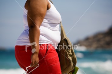 ist2_2592411_fat_woman_at_the_beach.jpg